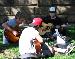 timothy and joshua playing guitar at walla wallas downtown park